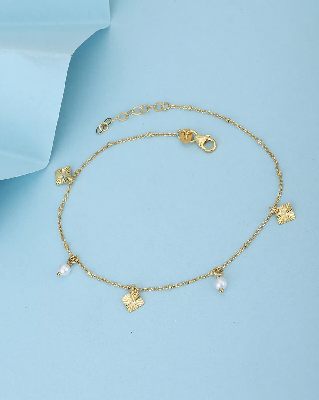 Carlton London 18Kt Gold Plated Anklet With Dangling Pearls & Charms